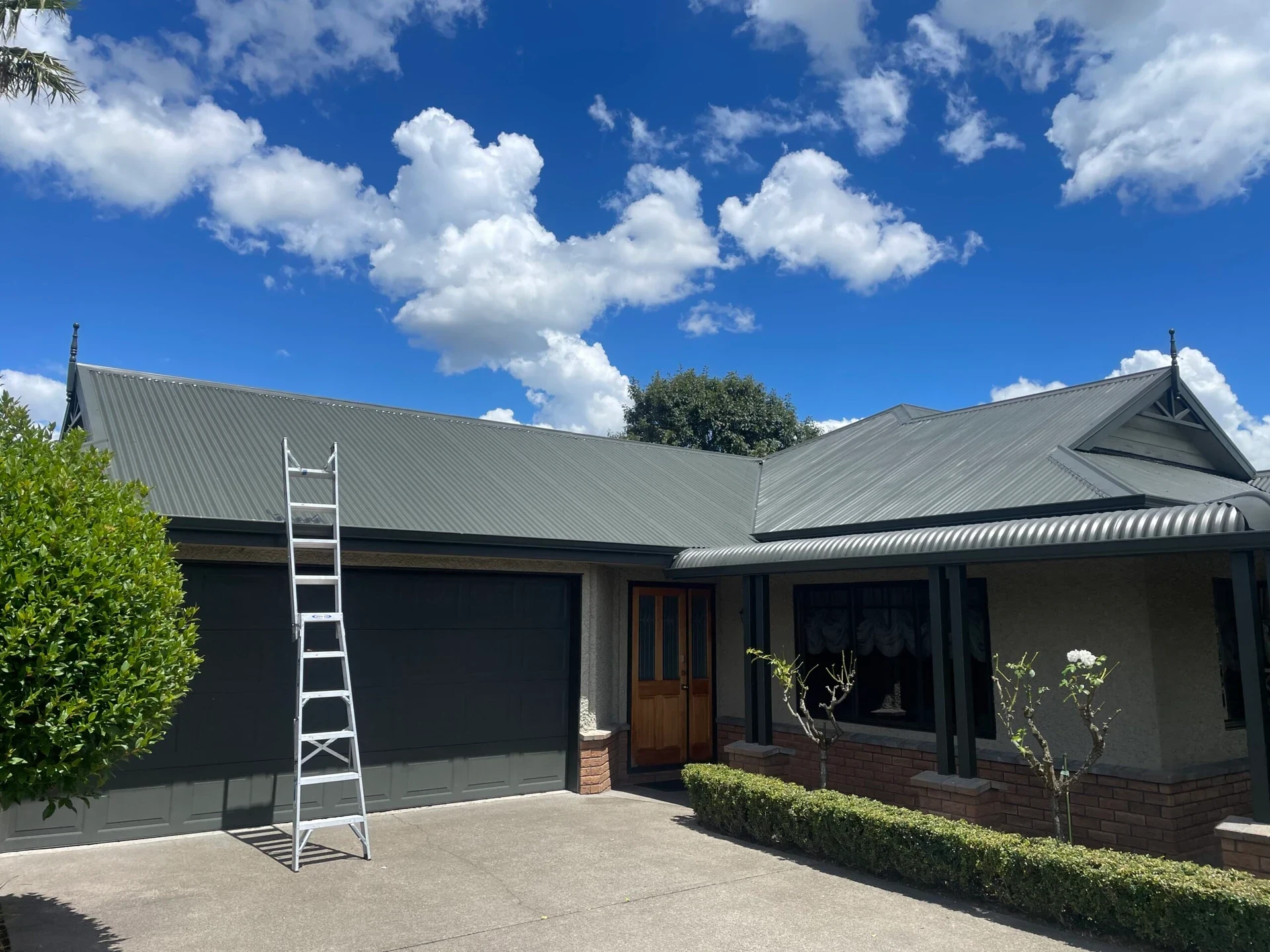 Completed roof painting job ready for inspection