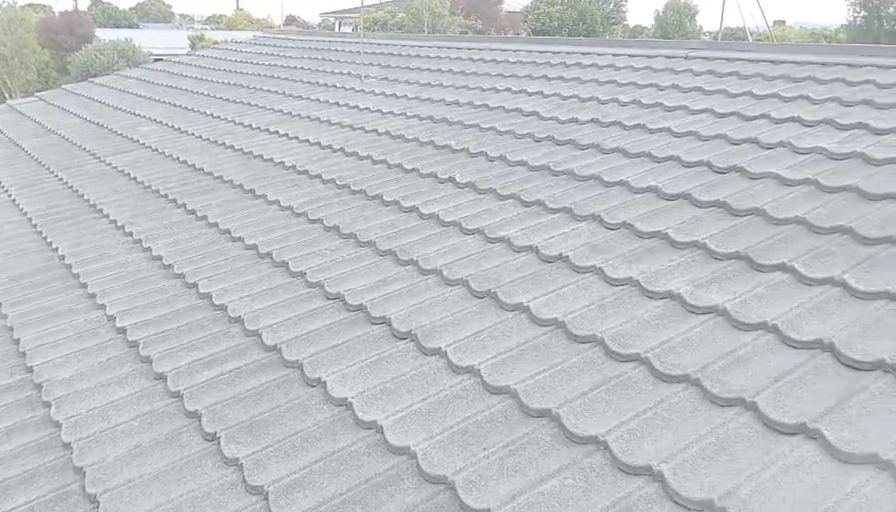 Decromastic roof stone-chip rebuilding and base coat preparation in Hamilton