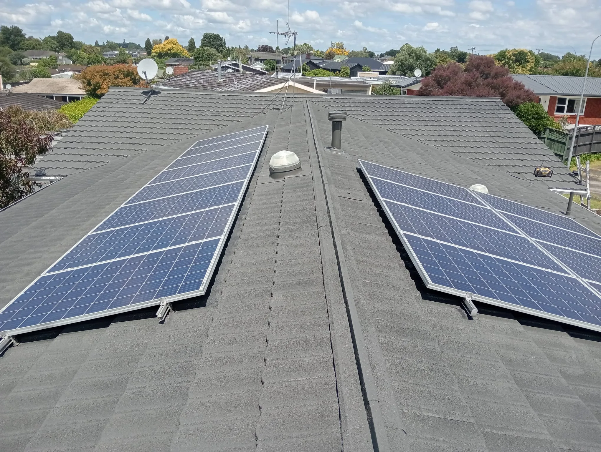 Finished decromastic roof restoration in Ironsand colour in Hamilton
