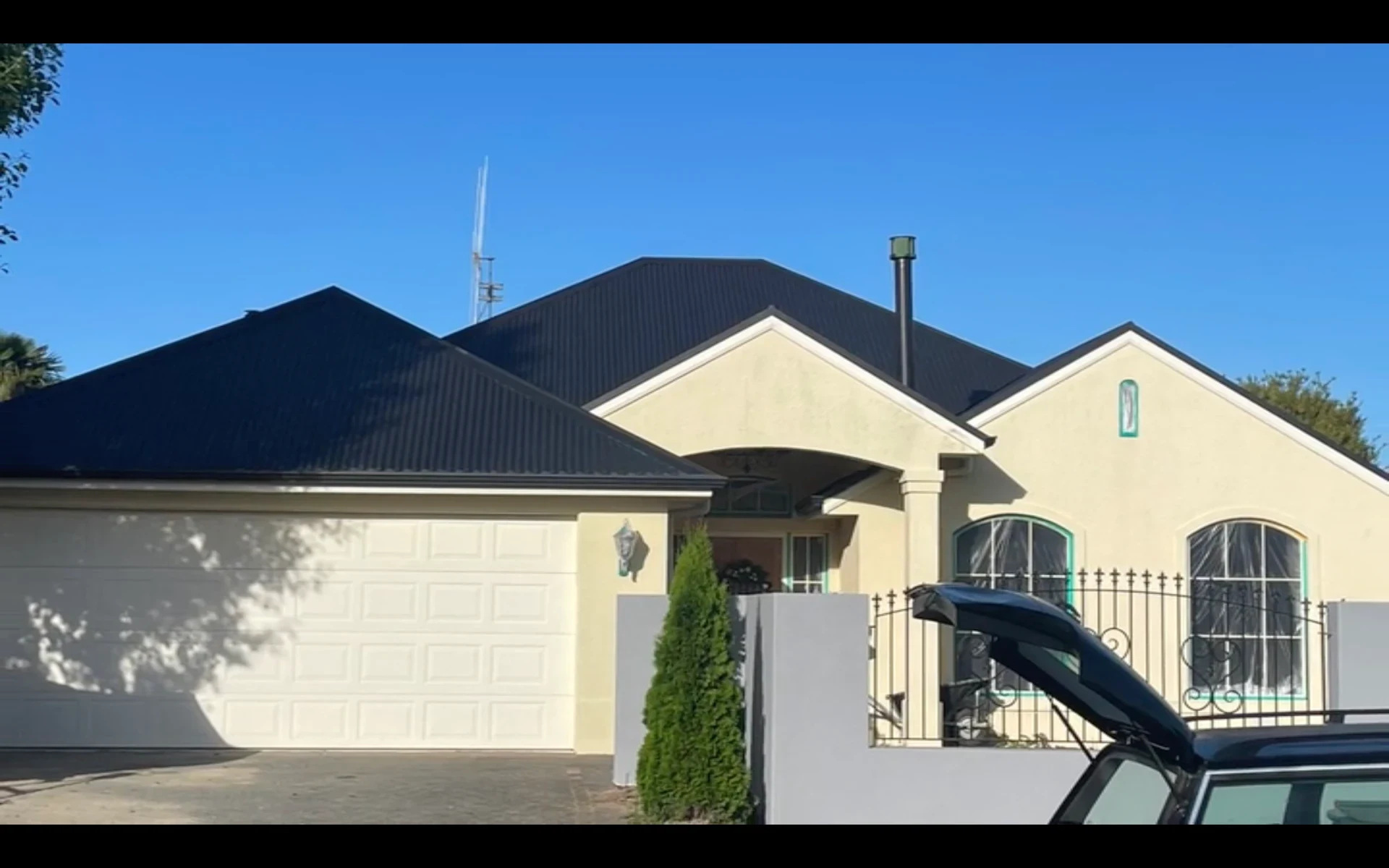 Hamilton home with newly painted black roof