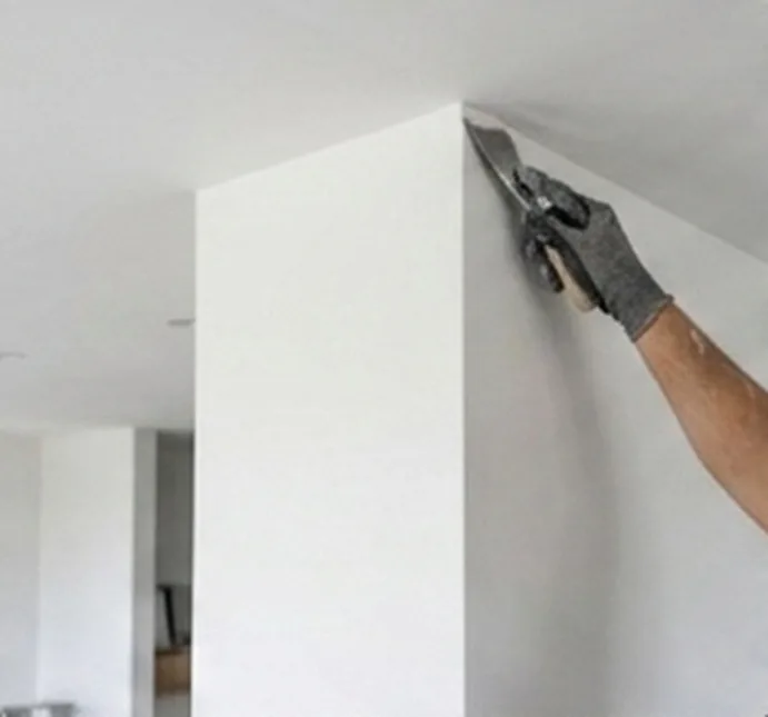 Paint-ready smooth walls after Level 5 plastering, prepared for interior painting